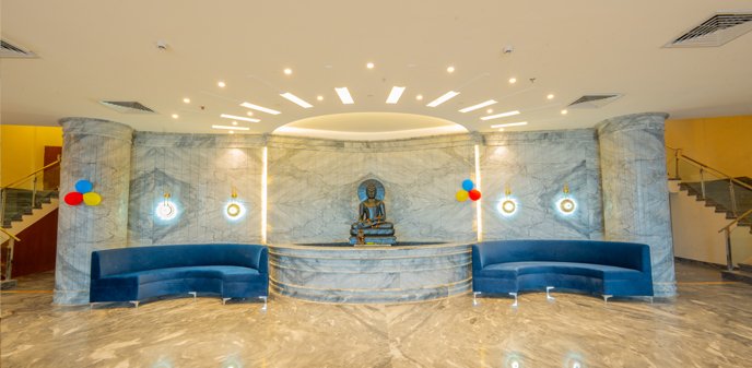 Welcome lobby or overview of The White Lotus Suites Vaishali, 4 star hotel.